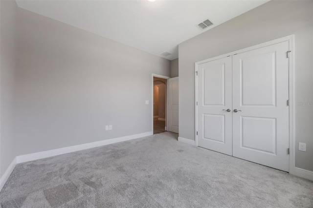 1740 Standing Rock Cir, Oakland, FL 34787 - unfurnished bedroom featuring light carpet and a closet