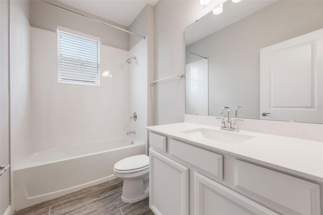 1740 Standing Rock Cir, Oakland, FL 34787 - full bathroom with vanity, wood finished floors, and shower / bath combination