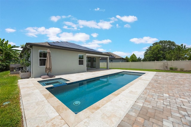 1740 Standing Rock Cir, Oakland, FL 34787 - view of swimming pool featuring a patio, a pool with connected hot tub, and a fenced backyard
