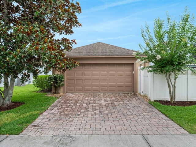 15647 Braintree Ln, Winter Garden, FL 34787 - garage with decorative driveway