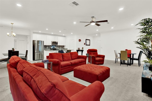 804 Glen Creek Ct, Fruitland Park, FL 34731 - living area with a chandelier, recessed lighting, light carpet, ceiling fan, and baseboards