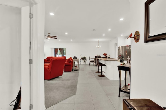 804 Glen Creek Ct, Fruitland Park, FL 34731 - corridor with recessed lighting, light tile patterned floors, and a chandelier