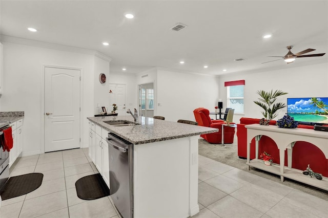 804 Glen Creek Ct, Fruitland Park, FL 34731 - kitchen featuring stainless steel dishwasher, a sink, light tile patterned floors, light stone counters, and recessed lighting