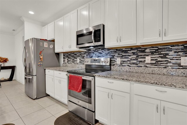 804 Glen Creek Ct, Fruitland Park, FL 34731 - kitchen featuring stainless steel appliances, ornamental molding, tasteful backsplash, white cabinets, and recessed lighting