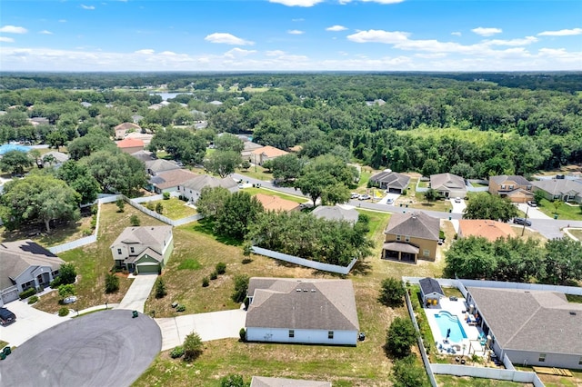 804 Glen Creek Ct, Fruitland Park, FL 34731 - aerial perspective of suburban area with a pool and a heavily wooded area
