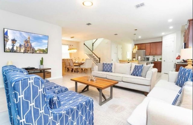 1625 Nassau Point Trl, Kissimmee, FL 34747 - living area featuring stairs and recessed lighting