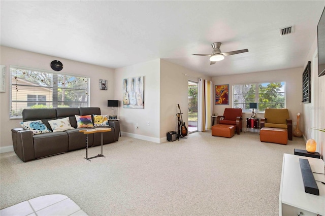 4549 Tippecanoe Trl Unit 20, Sarasota, FL 34233 - carpeted living room with baseboards and a ceiling fan