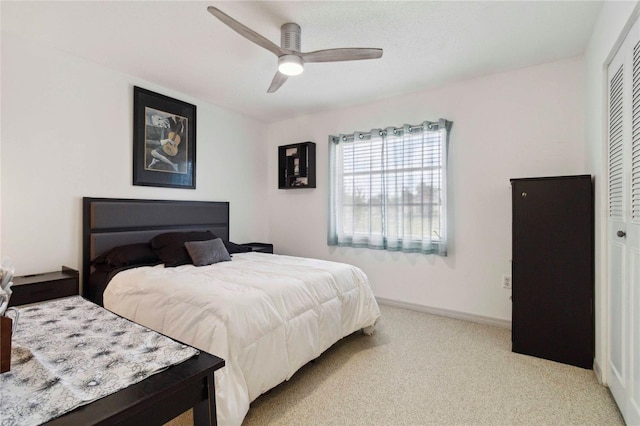 4549 Tippecanoe Trl Unit 20, Sarasota, FL 34233 - carpeted bedroom with a closet, ceiling fan, and baseboards