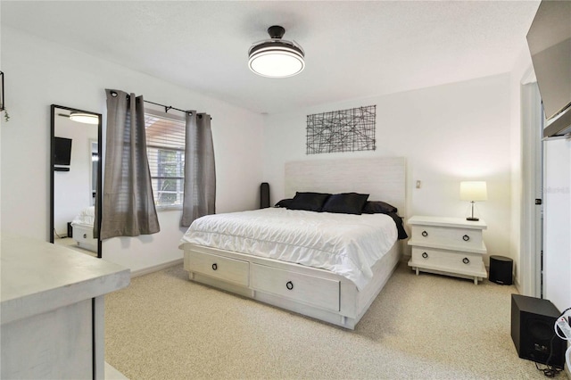 4549 Tippecanoe Trl Unit 20, Sarasota, FL 34233 - bedroom with light carpet