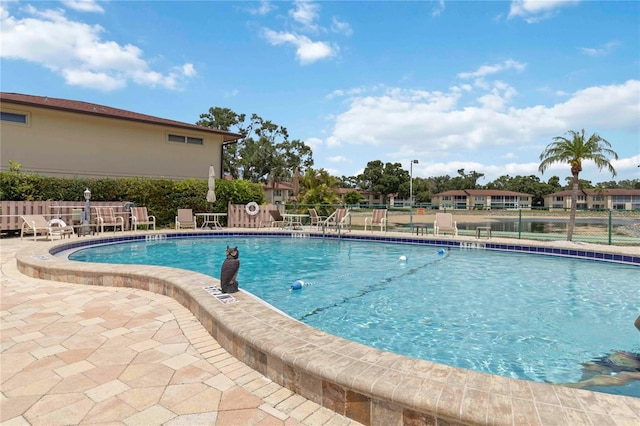 4549 Tippecanoe Trl Unit 20, Sarasota, FL 34233 - community pool featuring a patio