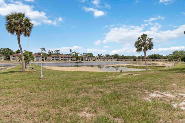 4549 Tippecanoe Trl Unit 20, Sarasota, FL 34233 - view of green lawn featuring a water view