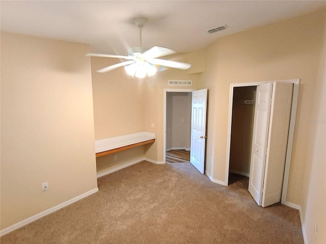 2555 Palmetto Ridge Cir, Apopka, FL 32712 - unfurnished bedroom featuring carpet flooring, a closet, and a ceiling fan
