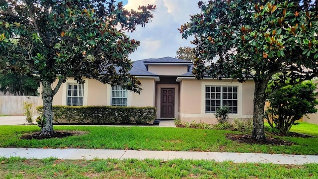 2555 Palmetto Ridge Cir, Apopka, FL 32712 - view of property hidden behind natural elements featuring stucco siding