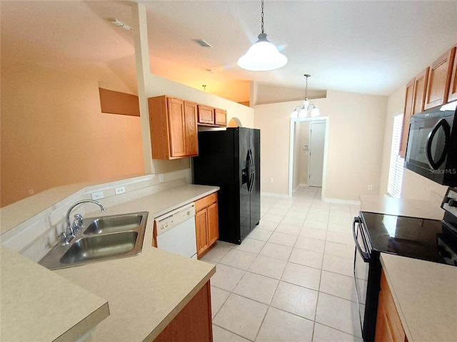 2555 Palmetto Ridge Cir, Apopka, FL 32712 - kitchen with black appliances, lofted ceiling, light countertops, light tile patterned flooring, and decorative light fixtures