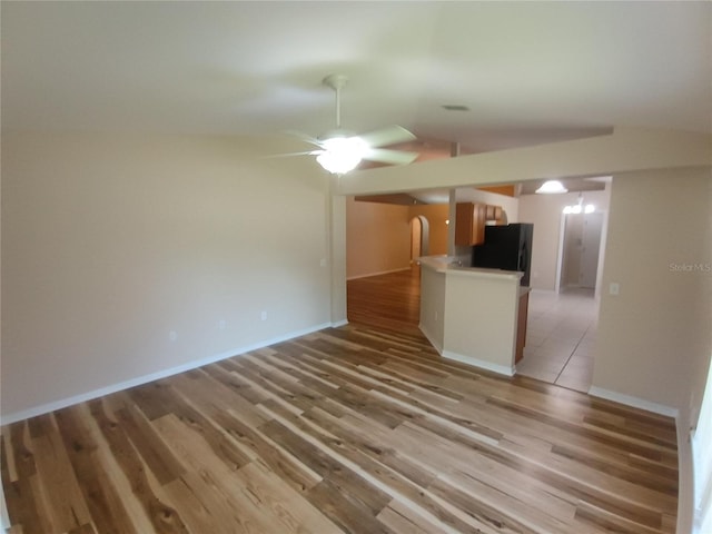 2555 Palmetto Ridge Cir, Apopka, FL 32712 - unfurnished living room with light wood-style floors and ceiling fan