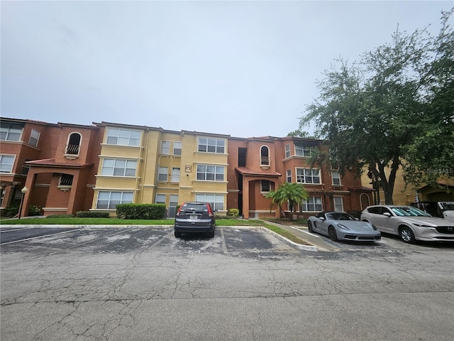 5160 Conroy Rd Unit 1437, Orlando, FL 32811 - view of property with uncovered parking