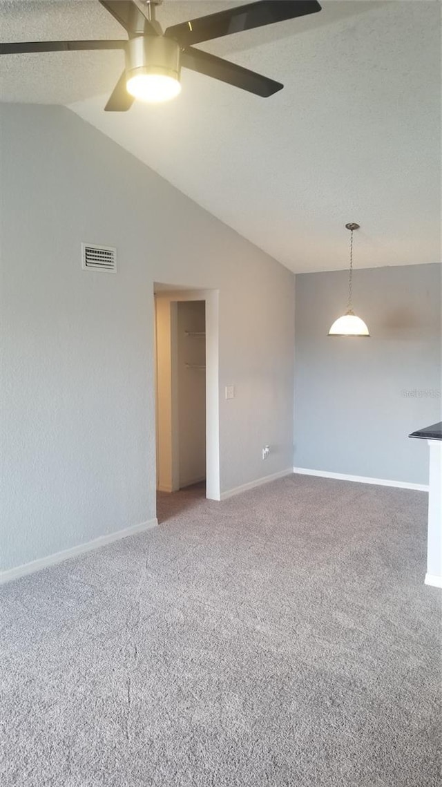 5160 Conroy Rd Unit 1437, Orlando, FL 32811 - carpeted spare room featuring ceiling fan, lofted ceiling, and baseboards