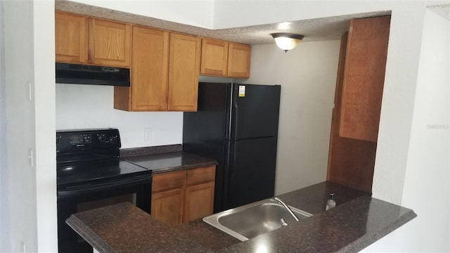 5160 Conroy Rd Unit 1437, Orlando, FL 32811 - kitchen with black appliances, under cabinet range hood, a sink, and brown cabinetry