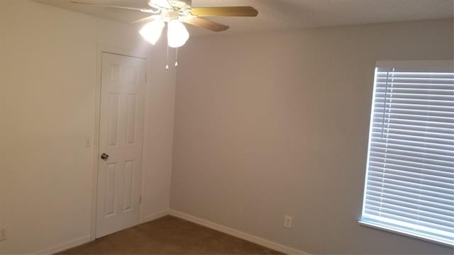 5160 Conroy Rd Unit 1437, Orlando, FL 32811 - carpeted spare room featuring ceiling fan and baseboards