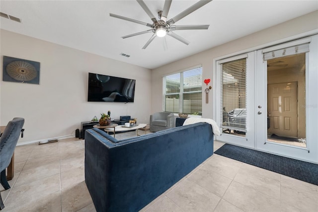 15693 Kinnow Mandarin Ln, Winter Garden, FL 34787 - living room featuring ceiling fan, light tile patterned floors, and baseboards