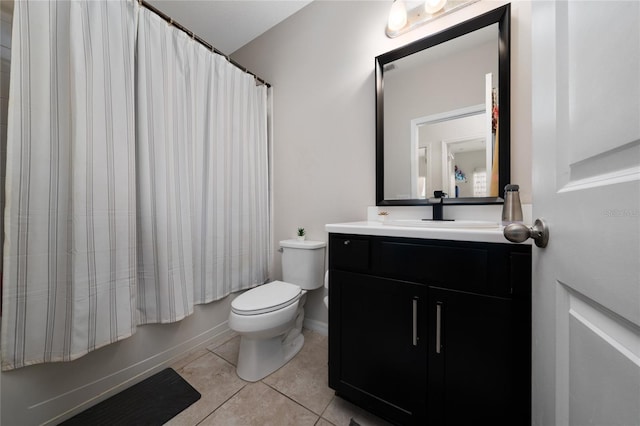 15693 Kinnow Mandarin Ln, Winter Garden, FL 34787 - bathroom with vanity, toilet, tile patterned flooring, shower / tub combo, and baseboards
