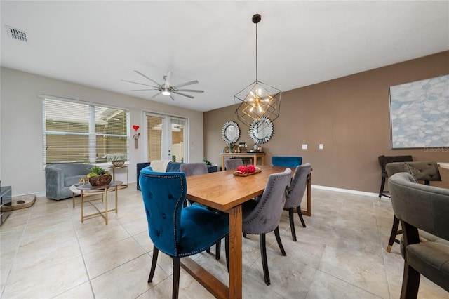 15693 Kinnow Mandarin Ln, Winter Garden, FL 34787 - dining area with ceiling fan, baseboards, and light tile patterned flooring
