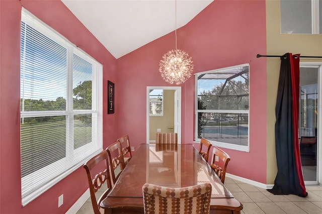 8113 Sun Palm Dr, Kissimmee, FL 34747 - dining space featuring a chandelier, light tile patterned flooring, high vaulted ceiling, and baseboards