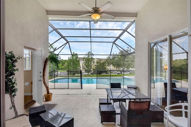 8113 Sun Palm Dr, Kissimmee, FL 34747 - view of pool with a patio area, a ceiling fan, glass enclosure, and a pool with connected hot tub