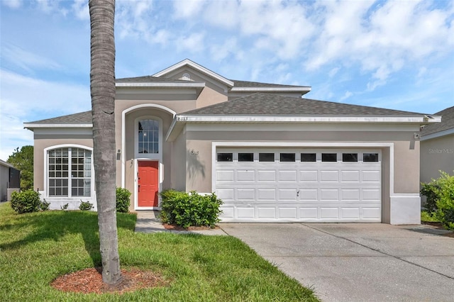 8113 Sun Palm Dr, Kissimmee, FL 34747 - view of front of house featuring driveway, a garage, stucco siding, and roof with shingles