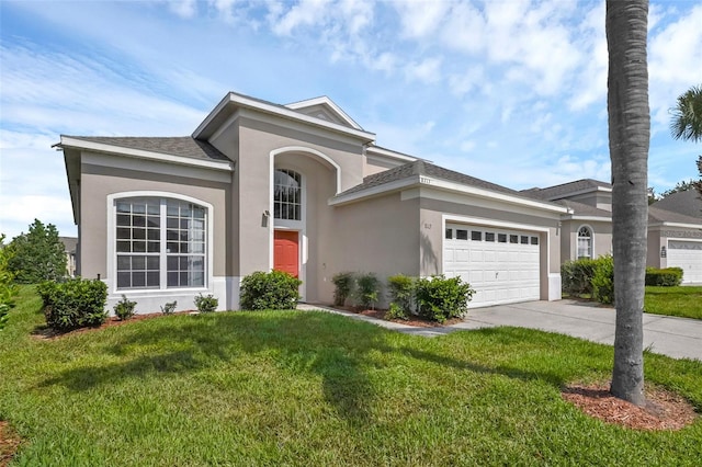 8113 Sun Palm Dr, Kissimmee, FL 34747 - view of front facade with stucco siding, an attached garage, concrete driveway, and a front lawn