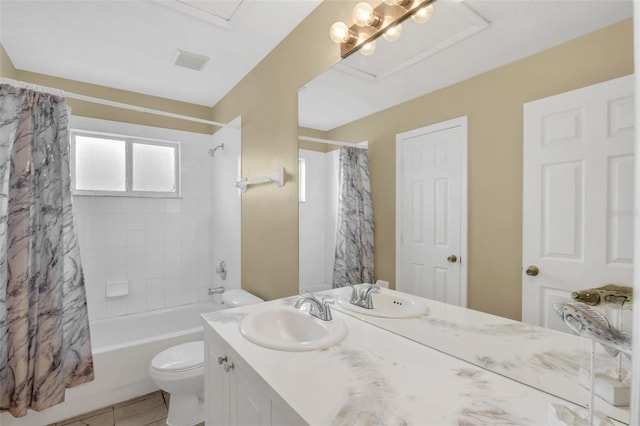 8113 Sun Palm Dr, Kissimmee, FL 34747 - full bathroom featuring vanity, shower / bath combo with shower curtain, toilet, and tile patterned floors