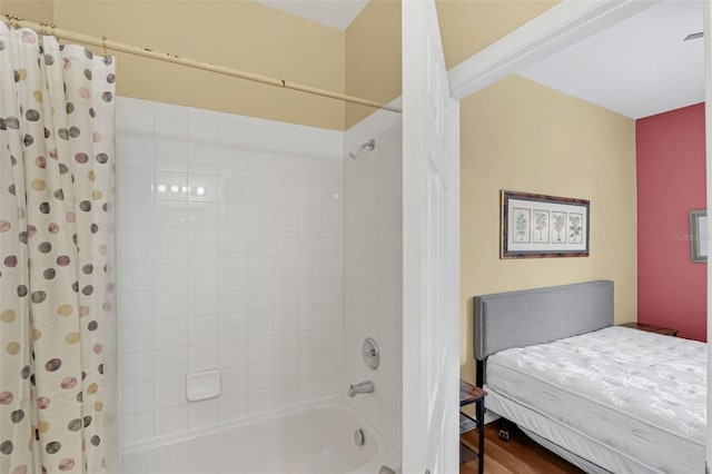 8113 Sun Palm Dr, Kissimmee, FL 34747 - full bath with shower / bathtub combination with curtain and wood finished floors