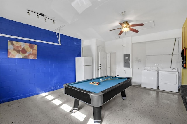 8113 Sun Palm Dr, Kissimmee, FL 34747 - recreation room featuring electric panel, ceiling fan, washing machine and dryer, and concrete block wall