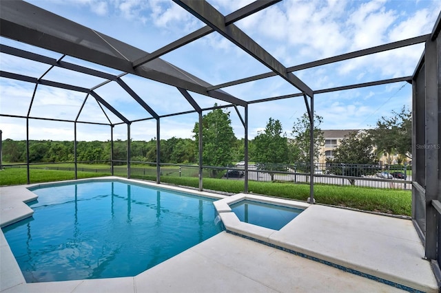 8113 Sun Palm Dr, Kissimmee, FL 34747 - view of pool with a patio area, a pool with connected hot tub, and glass enclosure