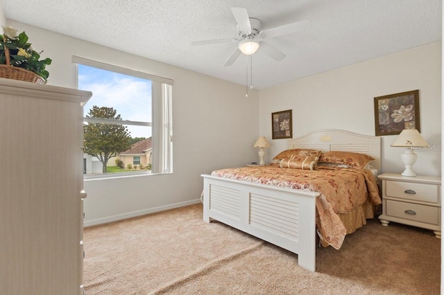 3018 Bransbury Ct, Kissimmee, FL 34747 - carpeted bedroom featuring ceiling fan and a textured ceiling