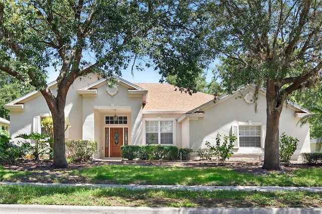 2674 Spicebush Loop, Apopka, FL 32712 - view of front facade with stucco siding