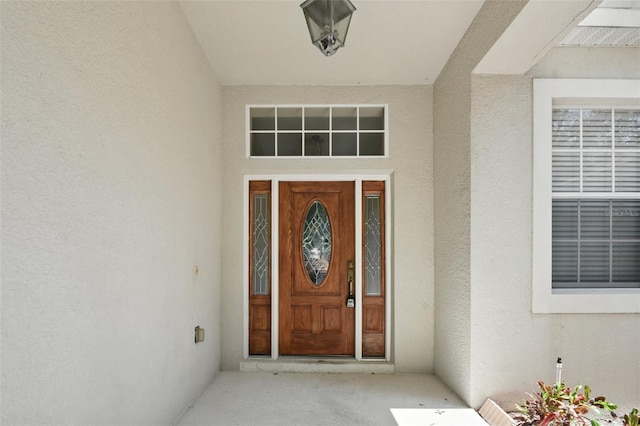 2674 Spicebush Loop, Apopka, FL 32712 - view of exterior entry featuring stucco siding