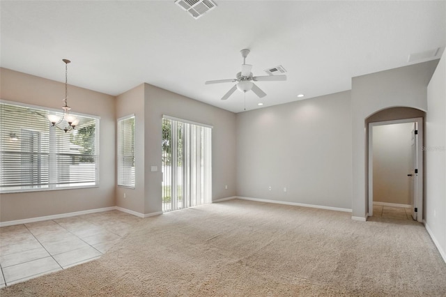 2674 Spicebush Loop, Apopka, FL 32712 - unfurnished room featuring arched walkways, a chandelier, baseboards, a ceiling fan, and recessed lighting