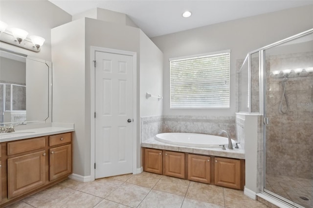2674 Spicebush Loop, Apopka, FL 32712 - bathroom with vanity, a bath, a shower stall, and tile patterned floors