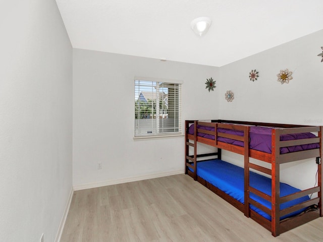 2311 Chatham Place Dr, Orlando, FL 32824 - bedroom featuring wood finished floors and baseboards