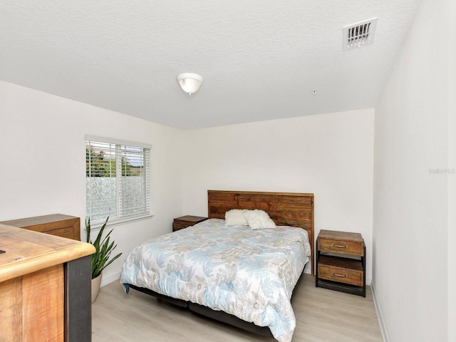 2311 Chatham Place Dr, Orlando, FL 32824 - bedroom with light wood-type flooring and baseboards