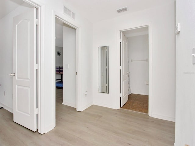 2311 Chatham Place Dr, Orlando, FL 32824 - corridor featuring light wood finished floors and baseboards