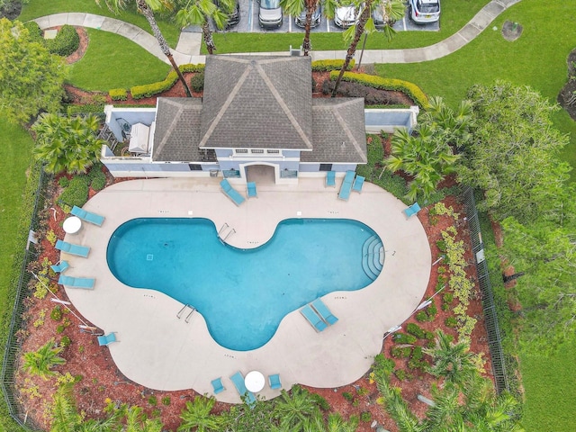 2311 Chatham Place Dr, Orlando, FL 32824 - swimming pool featuring a patio