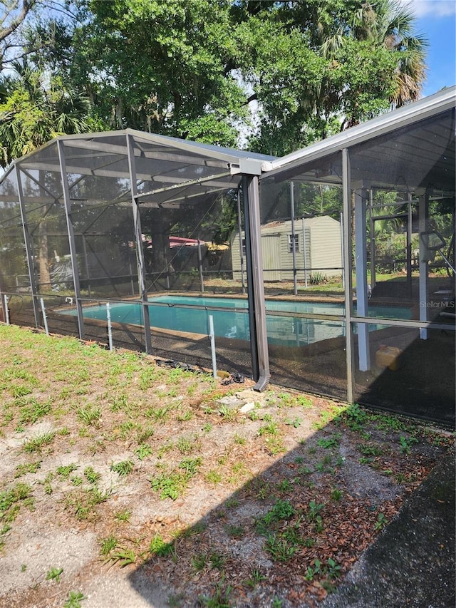 1245 Emeralda, Orlando, FL 32808 - swimming pool featuring a lanai