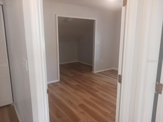 2181 Wekiwa Oaks Dr, Apopka, FL 32703 - corridor with wood finished floors and baseboards