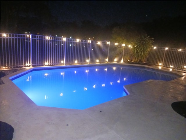 2181 Wekiwa Oaks Dr, Apopka, FL 32703 - view of pool at twilight