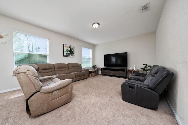 4952 Longmeadow Park St, Orlando, FL 32811 - carpeted living area with baseboards