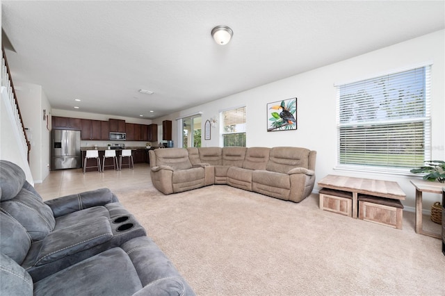 4952 Longmeadow Park St, Orlando, FL 32811 - living area featuring light colored carpet