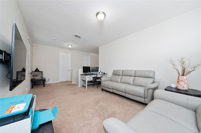 4952 Longmeadow Park St, Orlando, FL 32811 - carpeted living area with baseboards and a textured ceiling