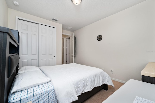 4952 Longmeadow Park St, Orlando, FL 32811 - bedroom featuring carpet floors, a closet, and baseboards